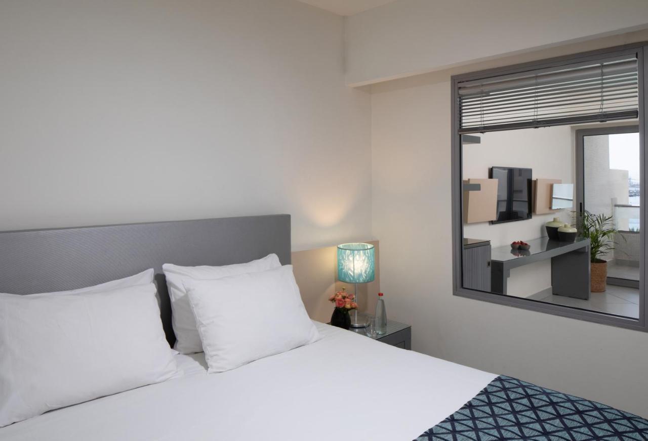Neptune Eilat By Dan Hotels Ngoại thất bức ảnh A bedroom at the hotel