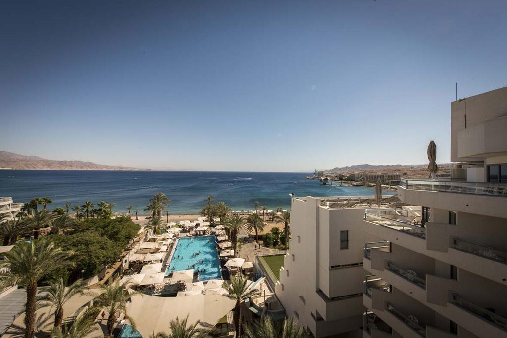 Neptune Eilat By Dan Hotels Ngoại thất bức ảnh View of the Red Sea from the Hilton Taba
