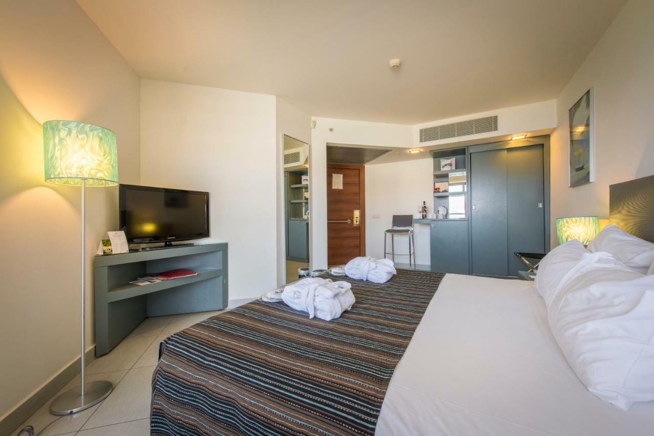 Neptune Eilat By Dan Hotels Ngoại thất bức ảnh A room at the hotel